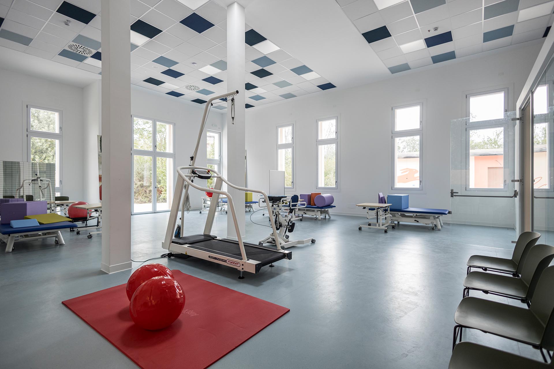 Gymnastics room with therapeutic equipment.