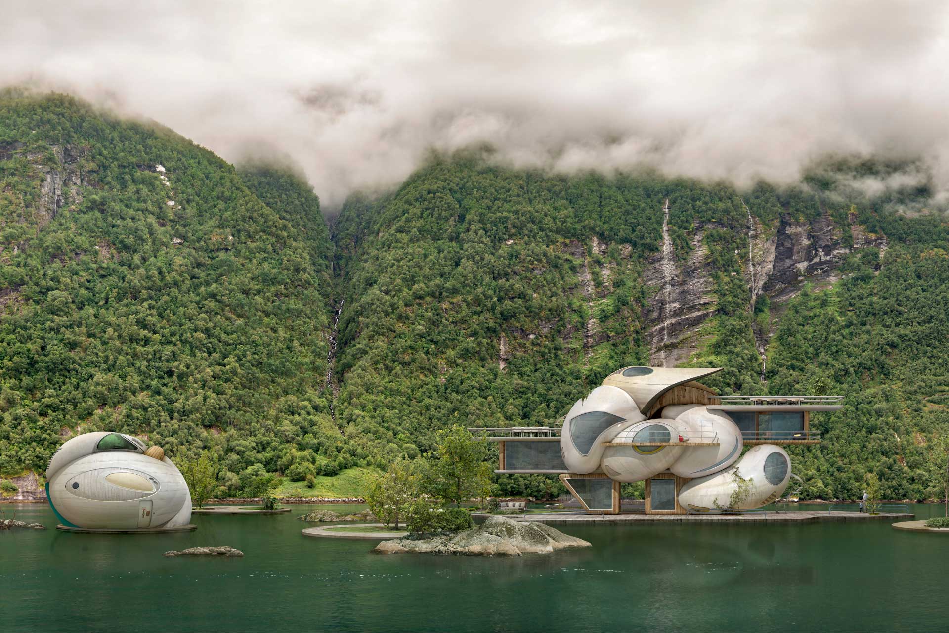 See vor einem begrüntem Berg. Am Ufer sind futuristische Kokons zu sehen.